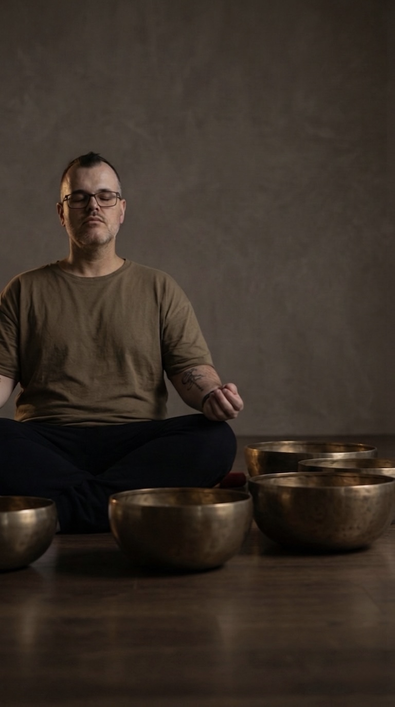 Scott with Tibetan singing bowls — sound healing Sydney